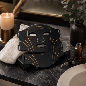 ThermaLight360 Glow mask on a marble vanity, spa setting
